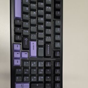 Mechanical Keyboard with Purple and Black Keys